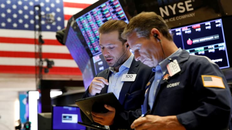 Traders work on the floor of the New York Stock Exchange (NYSE) in New York City, U.S., July 12, 2021.