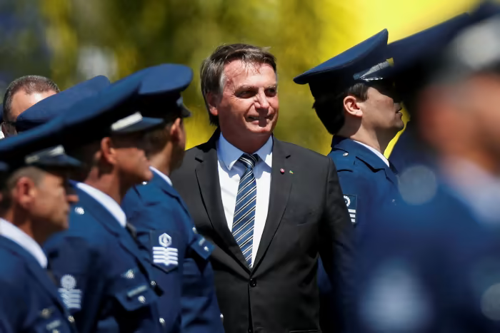 Brazil’s president Jair Bolsonaro looks on during a military ceremony