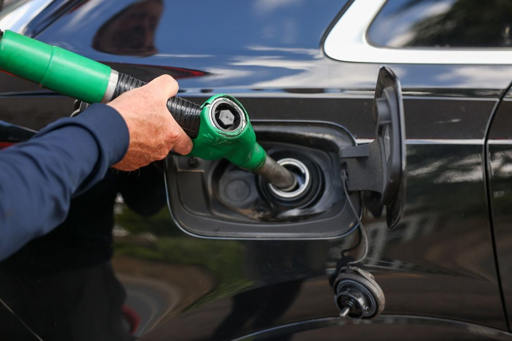 A customer fills up at a petrol station in Essex, UK.