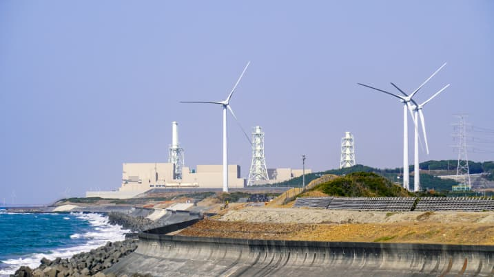 Energy mix of Hamaoka Nuclear Power Station and Omaezaki Wind Power Station on a sunny day in March 2022 in Omaezaki City, Shizuoka Prefecture