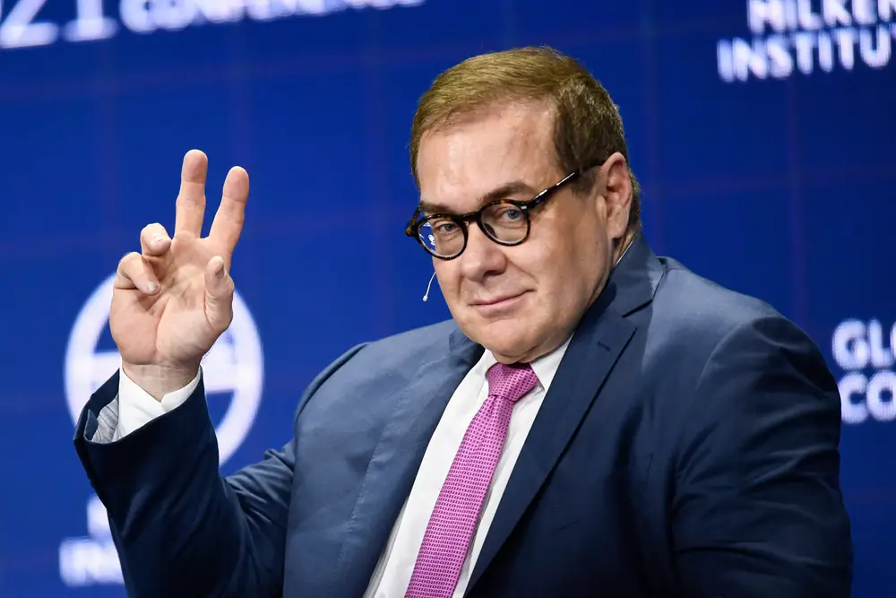 Scott Minerd, Global Chief Investment Officer at Guggenheim Partners, raises his hand during the 2021 Milken Institute Global Conference