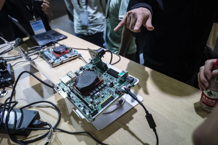 Attendees at an industry event last year examine AMD products. 