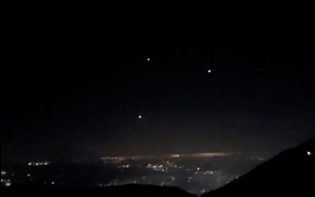 A screenshot of social media video shows projectiles in the sky after rockets were fired from Lebanon at the Haifa area, early November 22, 2024. (X screen capture; used in accordance with Clause 27a of the Copyright Law)